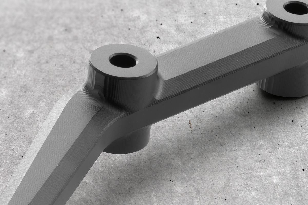 Silencer bracket SVARTPILEN, VITPILEN (125, 250, 401) 18-23